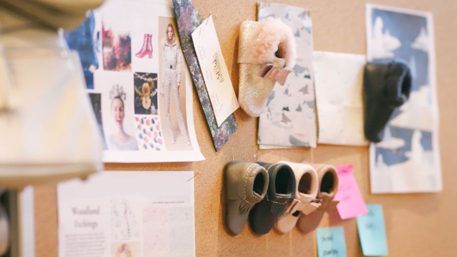 cork board with product ideas pinned to it